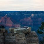 Panoramisch uitzicht vanaf Mather Point aan de South Rim van de Grand Canyon met de diepe kloof, rotsformaties en de verre horizon.